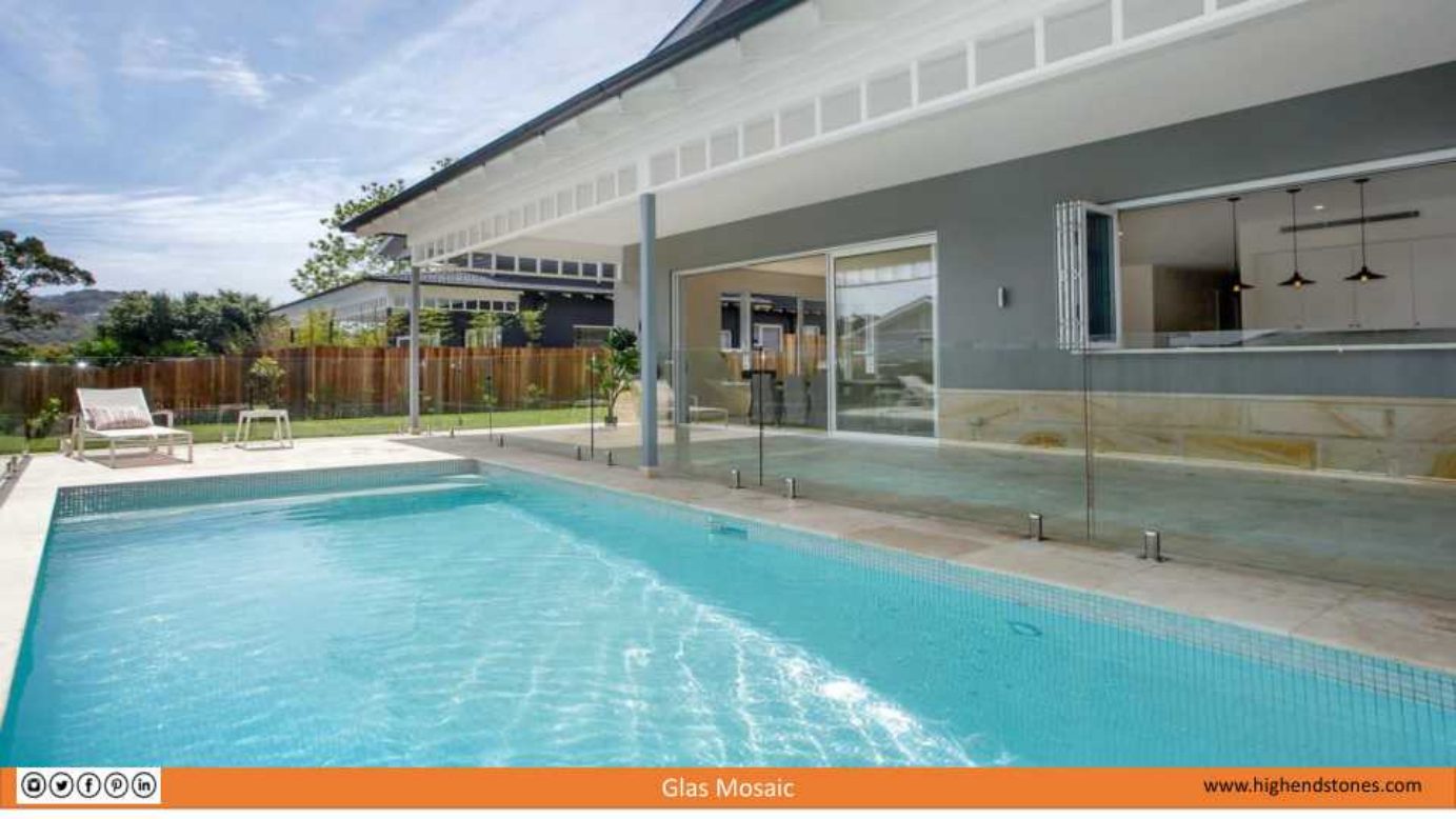 Long residential pool with light glass mosaic tile