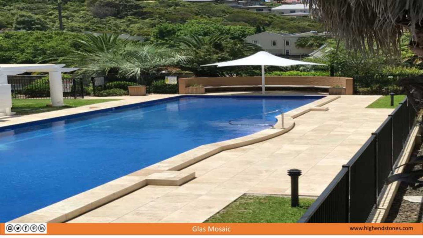 Classic backyard pool with glass mosaic waterline