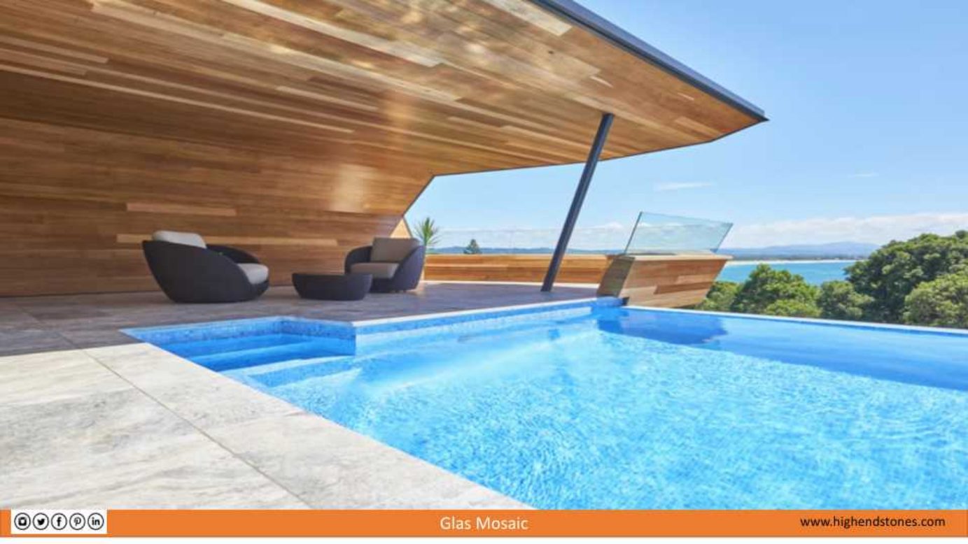 Pool deck and blue glass mosaic pool finish
