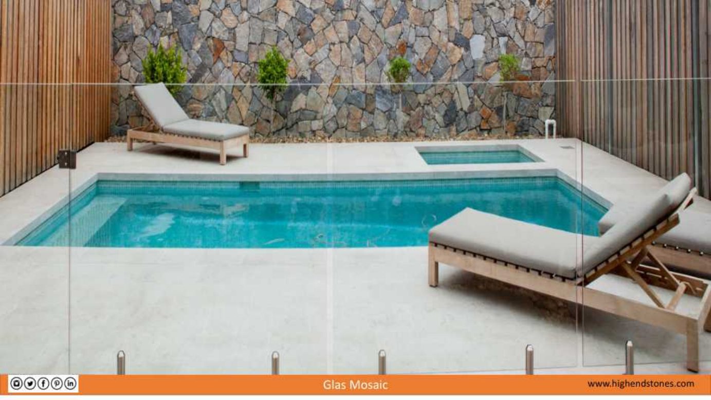 Courtyard spa wall with decorative tile and glass mosaic