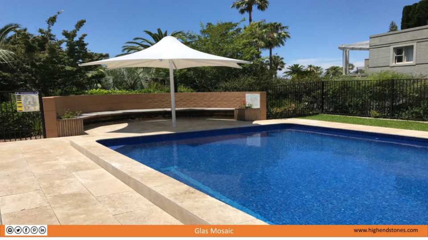 Backyard pool with blue waterline mosaic tile