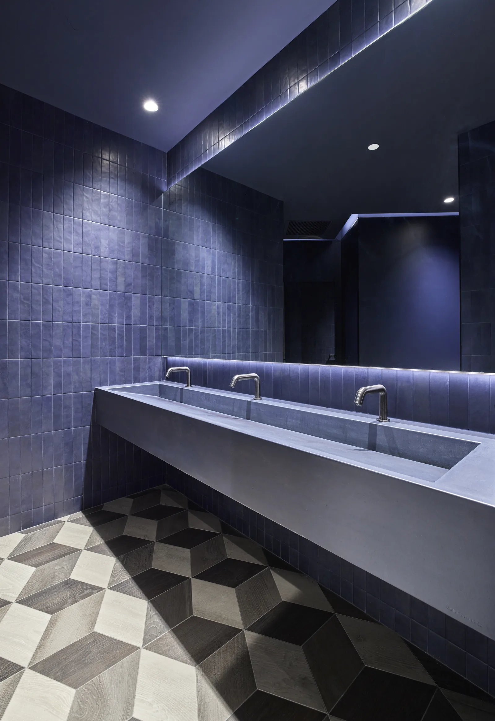 Restaurant restroom tile vanity wall