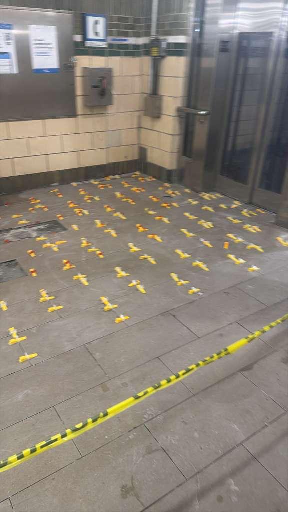 Newport PATH Station floor tile installation progress