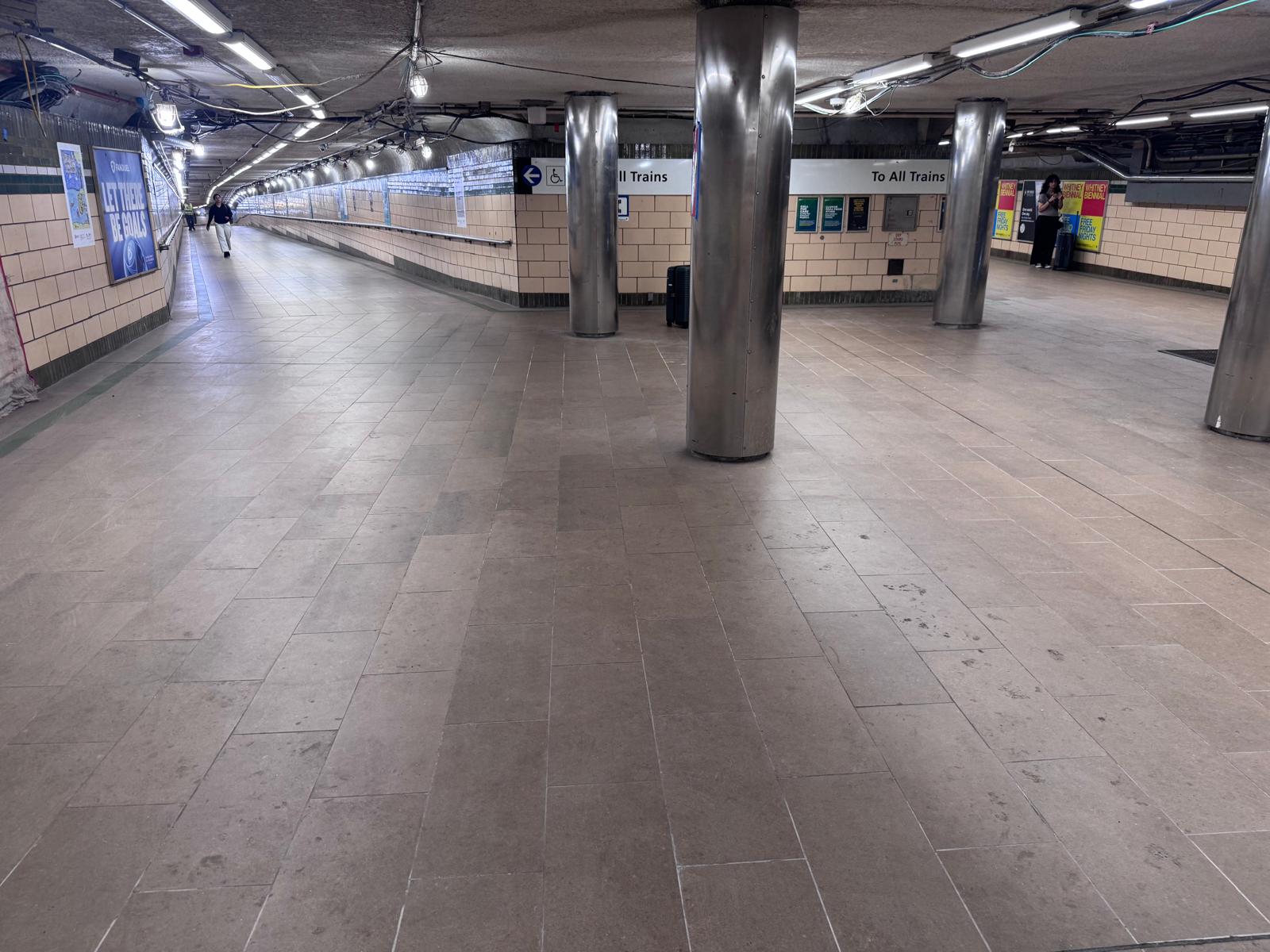 Newport PATH Station mezzanine floor tile installation