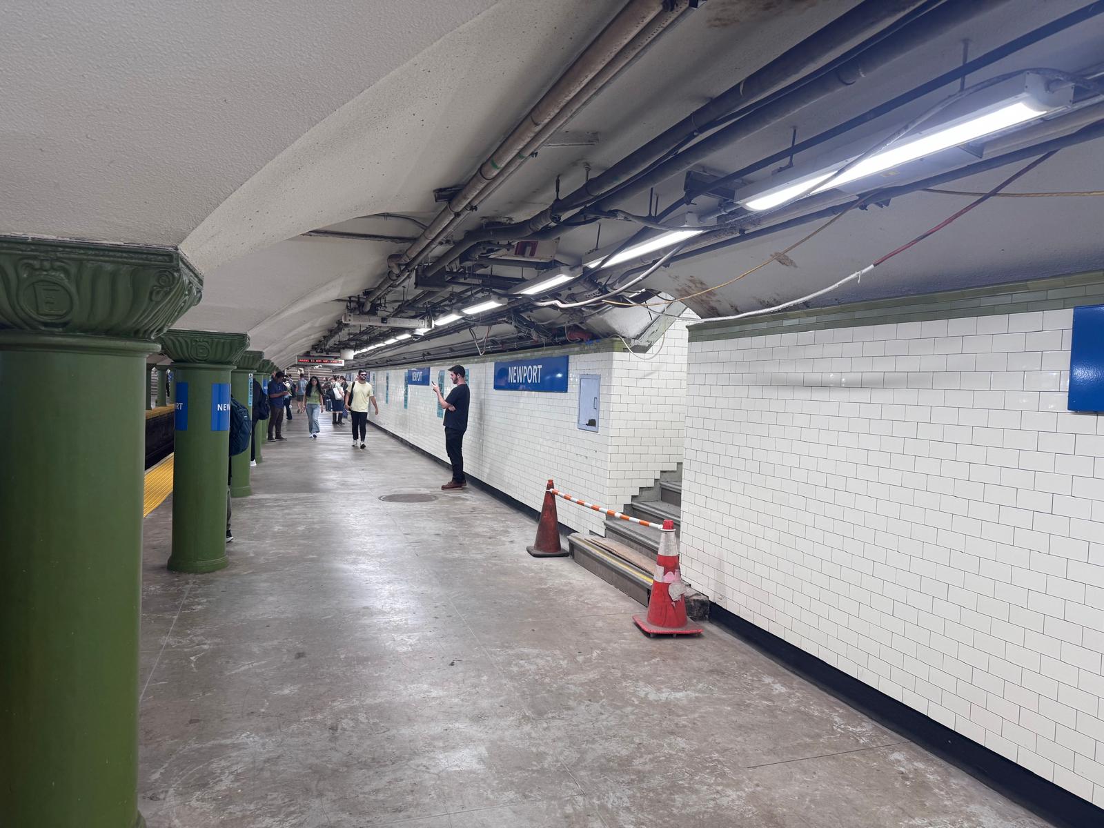 Newport PATH Station platform wall tile work by MJ Stone and Tile