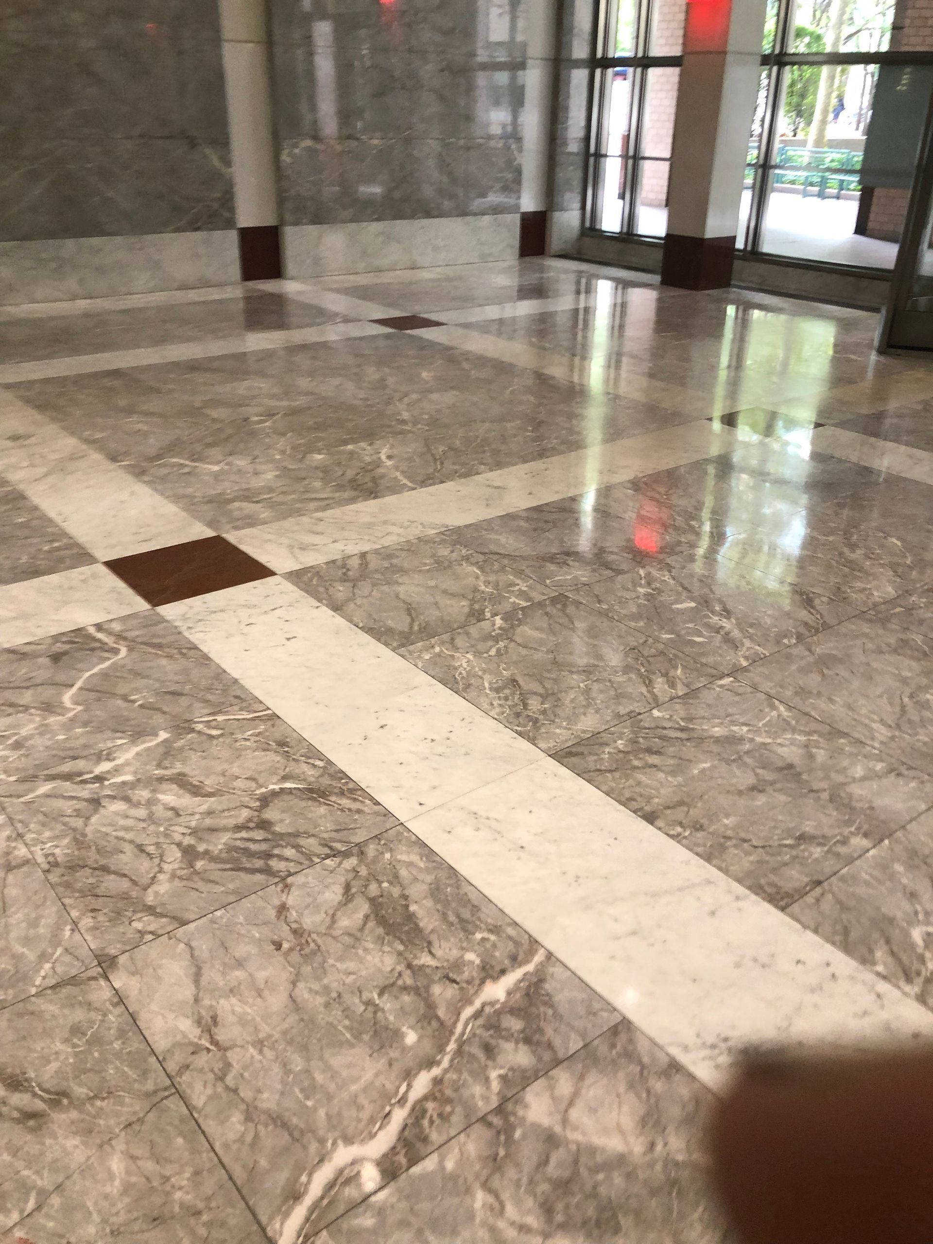 Commercial lobby stone and tile floor by MJ Stone and Tile