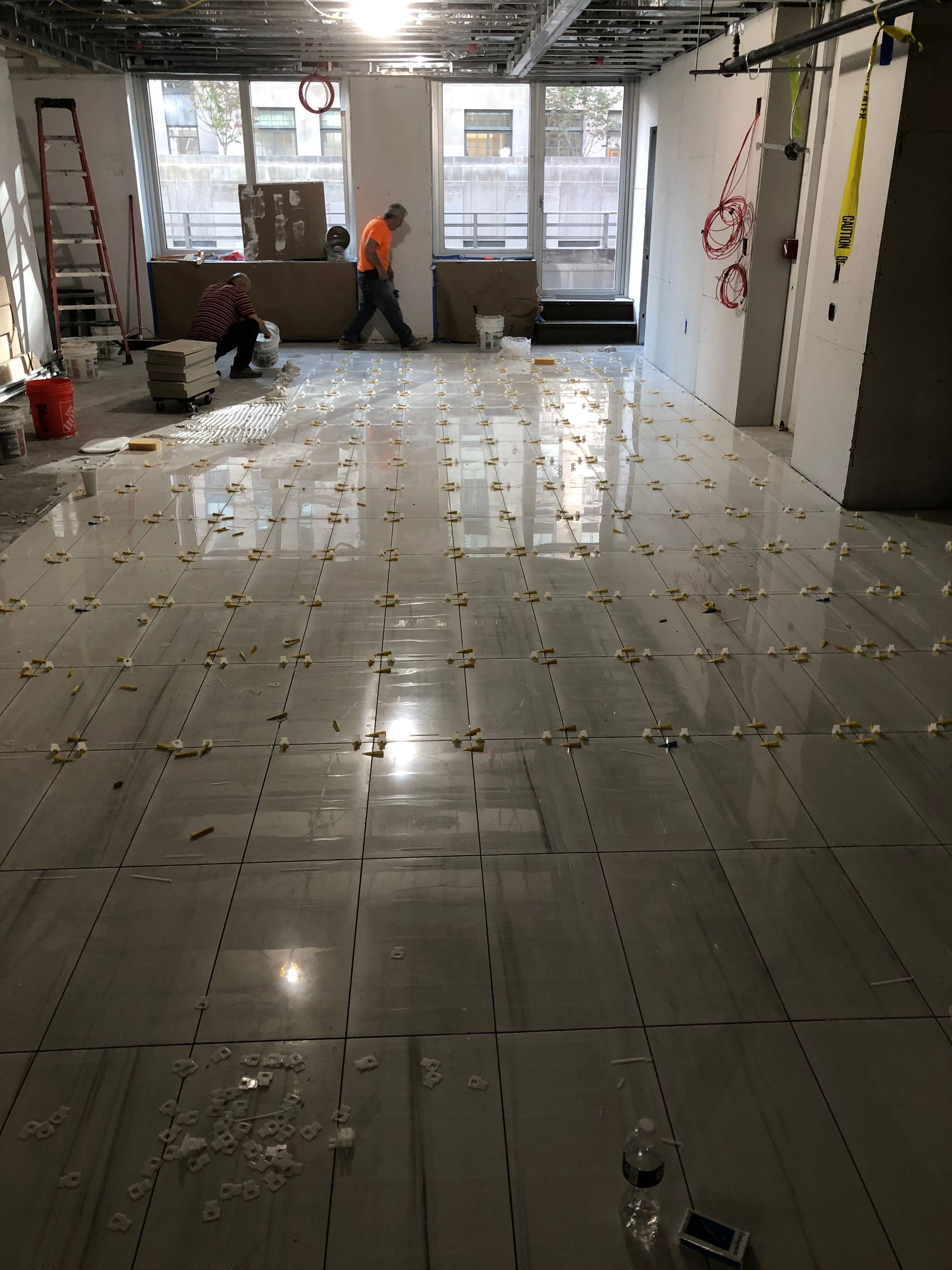 Commercial tile floor installation by MJ Stone and Tile