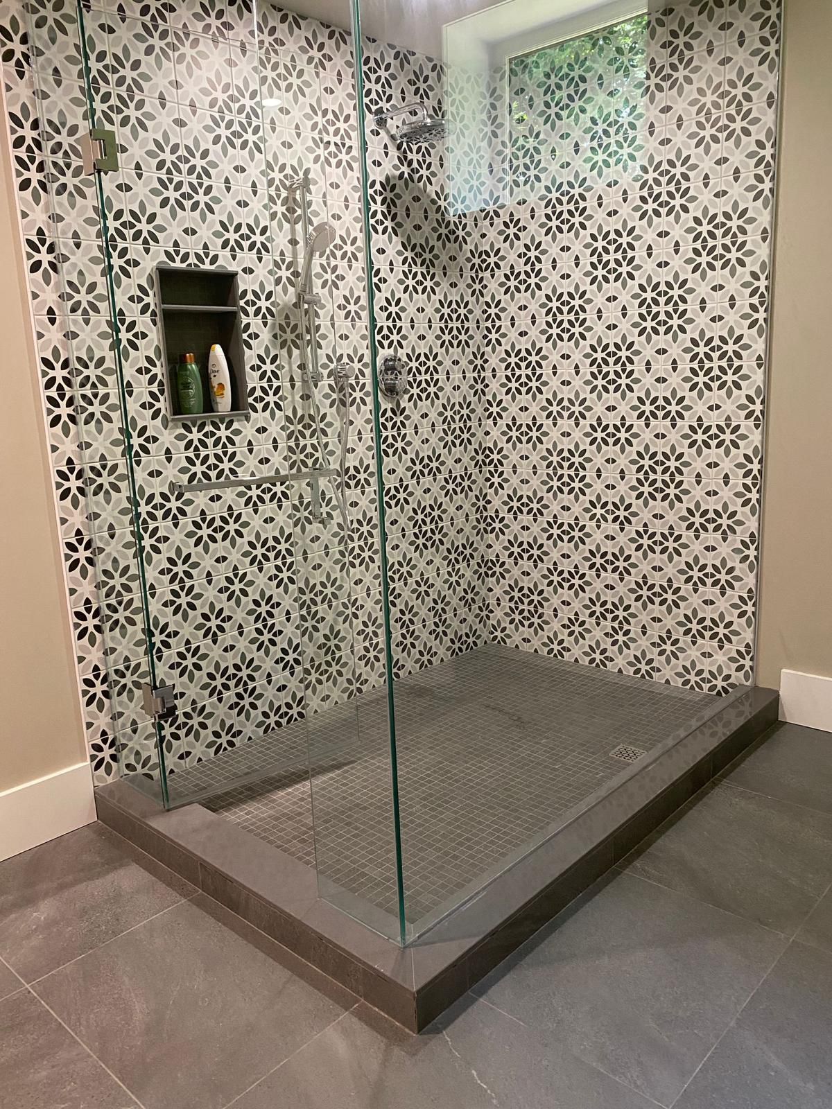 Patterned ceramic tile shower wall