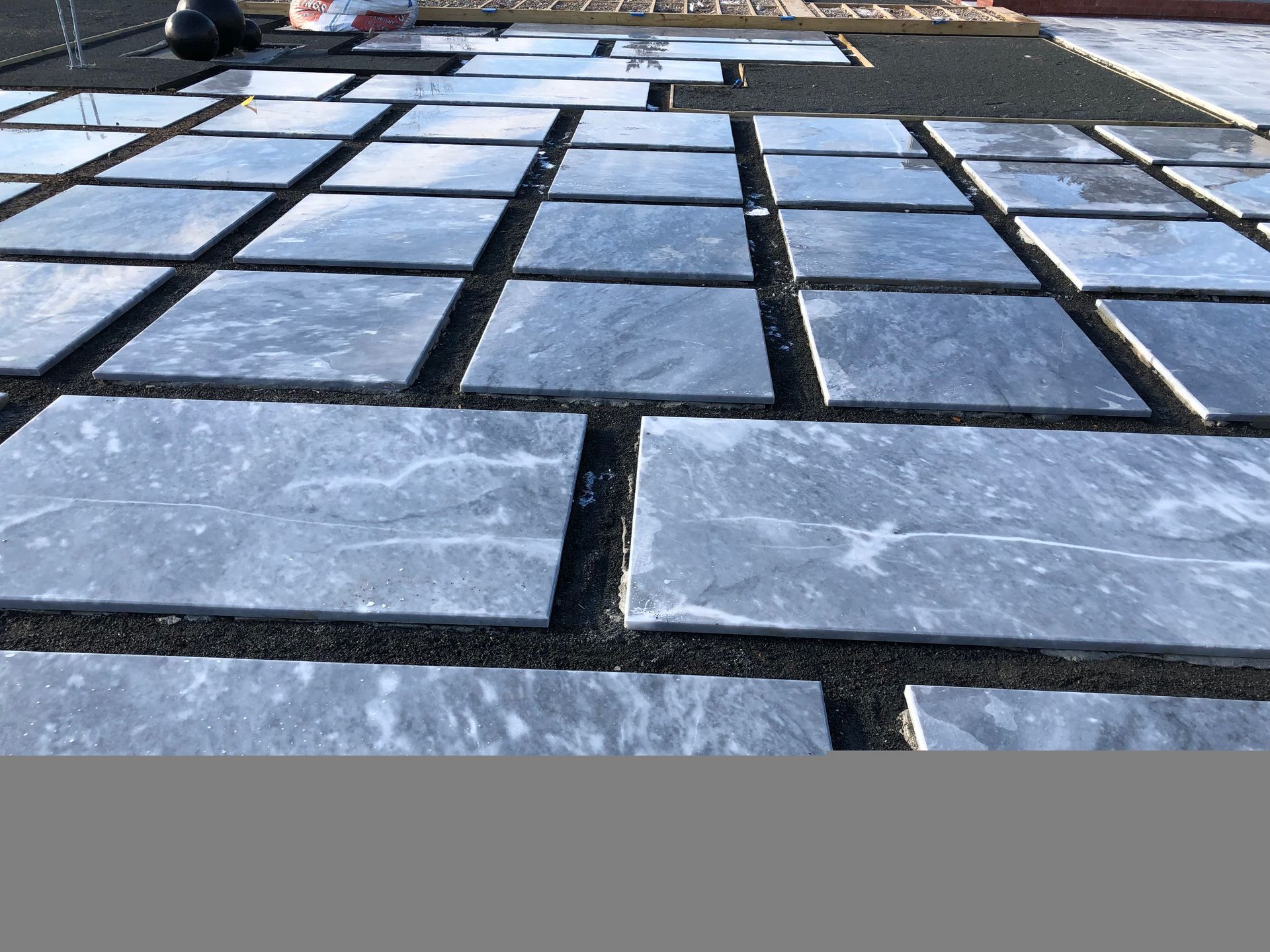 Commercial tile installation in progress